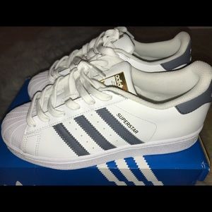 Gray and White Adidas Superstars